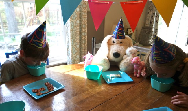 Planning a dog party? I'm sharing my favorite dog party ideas - including dog party games, the best dog party food, dog party decorations and (of course) the best dog party gifts! Great ideas for puppy and dog parties.