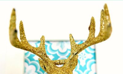 If you've ever wanted to try a DIY deer decor project, this is your time. Using supplies from the Dollar Stores or Dollar Tree, this simple and inexpensive deer antler decoration is perfect for Christmas or year round. This is a super easy craft that you're going to love. #deer #diy #christmas #craft #dollarstore #dollartree #antlers #diydeerdecorations #animalheads