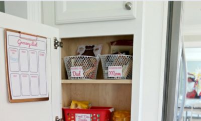 data-pin-description="Parents everywhere need to see this clever pantry organization solution created on behalf of On-Cor. This simple idea completely changed how my kids snack, and how involved I am with their choices. Whether you have a small pantry or a deep one, these pantry ideas (using containers from the Dollar Store) will have your entire family food situation organized (even the cereal)! Plus, grab your free pantry printables and grocery list (to hang on the pantry door). #ad #pantry #organization #freeprintables #kids #family" alt="Parents everywhere need to see this clever pantry organization solution created on behalf of On-Cor. This simple idea completely changed how my kids snack, and how involved I am with their choices. Whether you have a small pantry or a deep one, these pantry ideas (using containers from the Dollar Store) will have your entire family food situation organized (even the cereal)! Plus, grab your free pantry printables and grocery list (to hang on the pantry door). #ad #pantry #organization #freeprintables #kids #family"