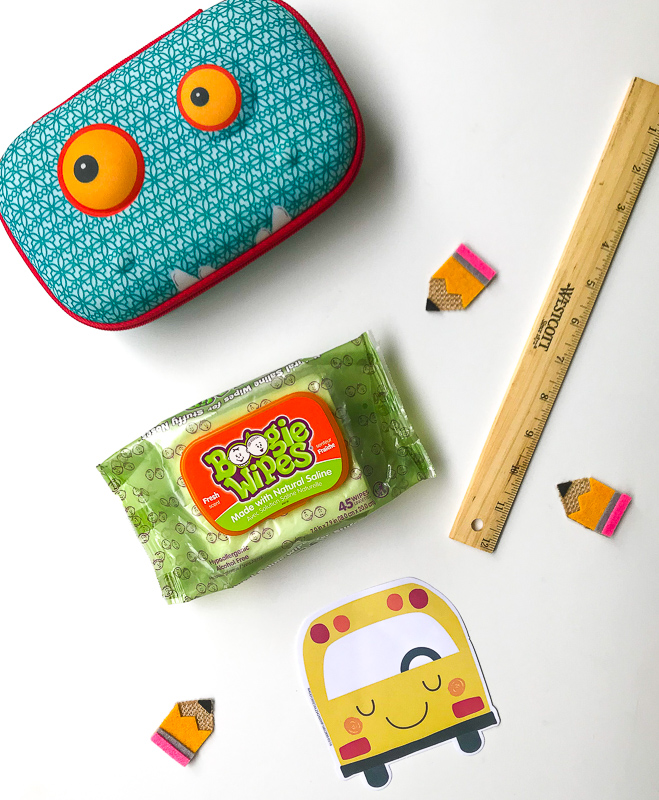 Boogie Wipes surrounded by school supplies