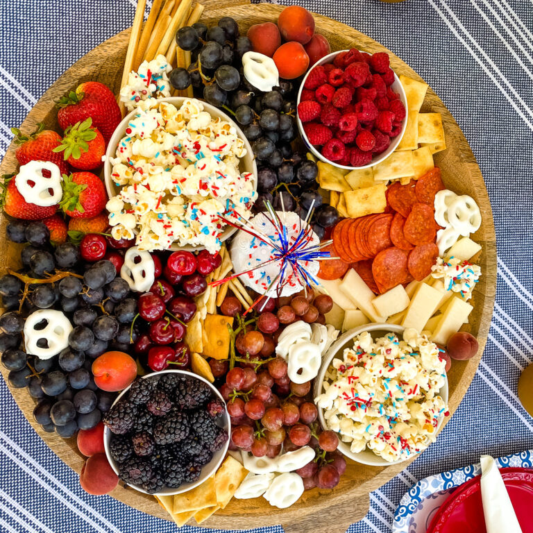 4th of July charcuterie board on blue tablecloth