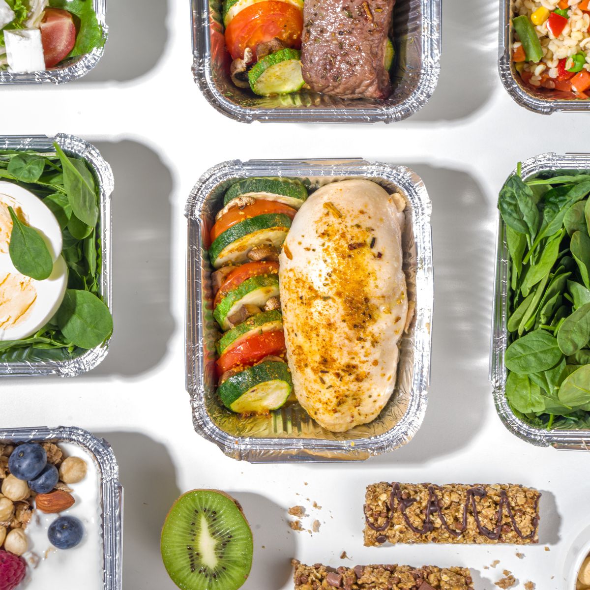 Packaged hot lunches in tin foil containers