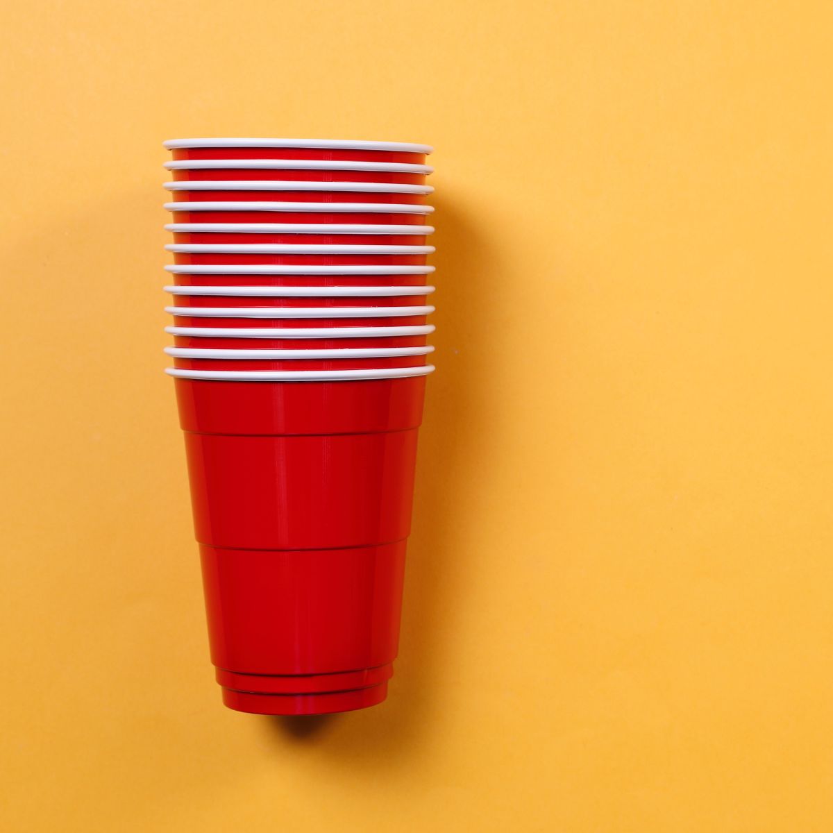 Red solo cups on yellow background