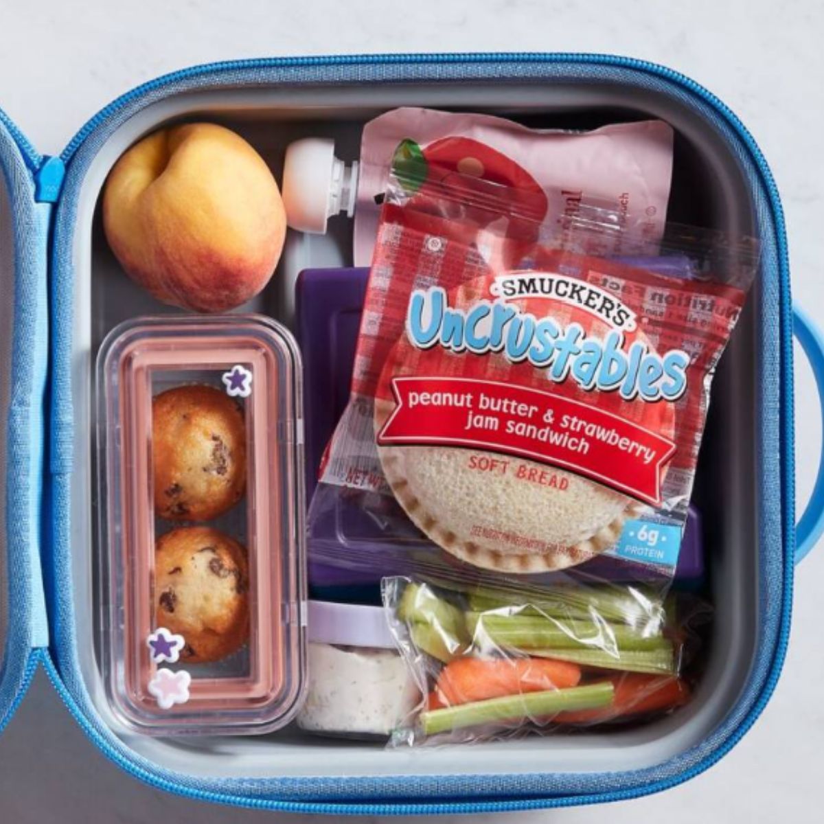 Uncrustables inside of a school lunch box