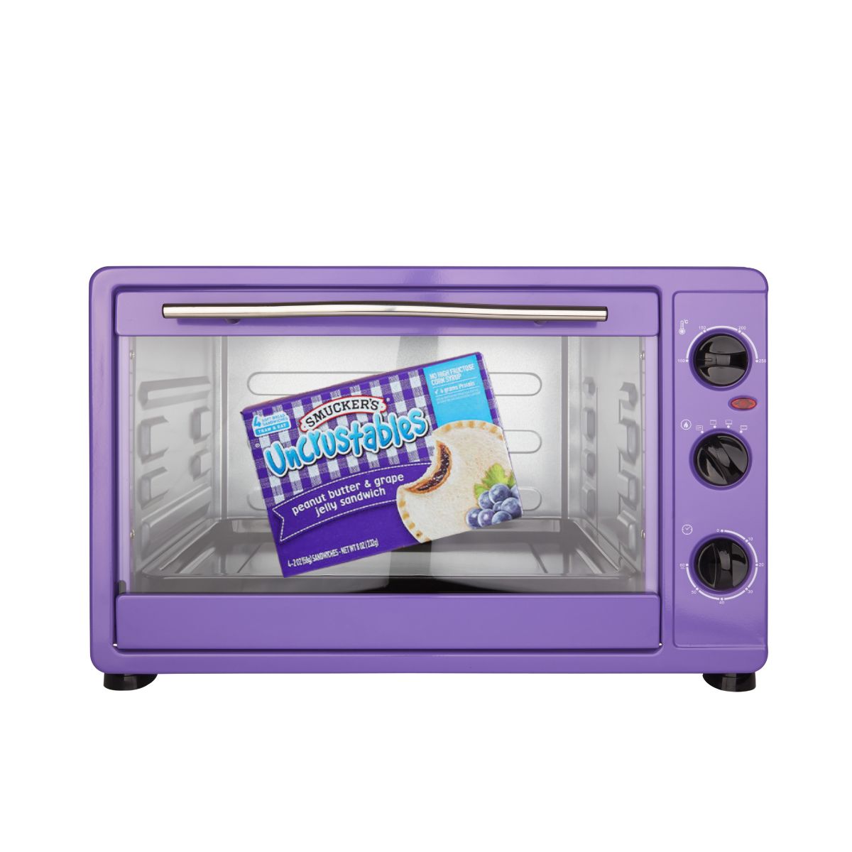 Purple toaster oven with grape uncrustables inside.