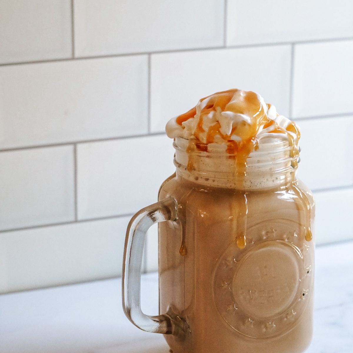 Starbucks Caramel Brulee Latte in a clear mug