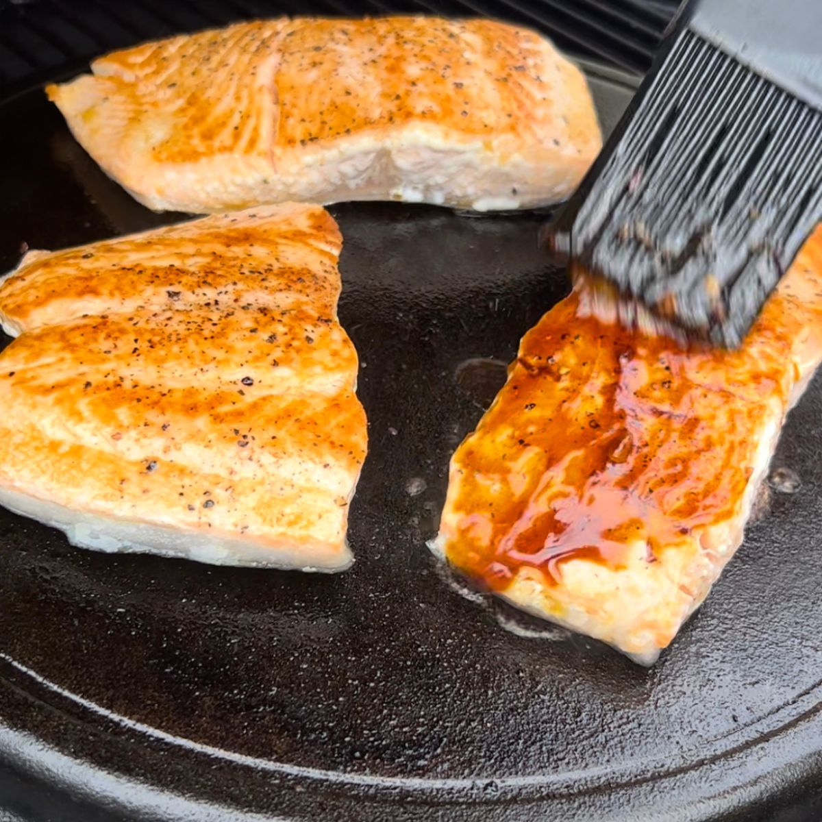 Step 4 - Sear salmon on the Plancha, flesh side down until a crispy crust forms (3-4 minutes).