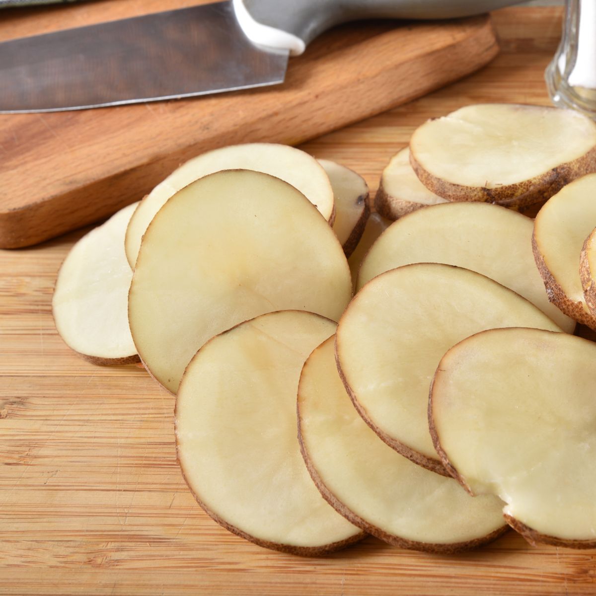 Step 1 of Microwave Potato Chips, slice potatoes in thin slices.