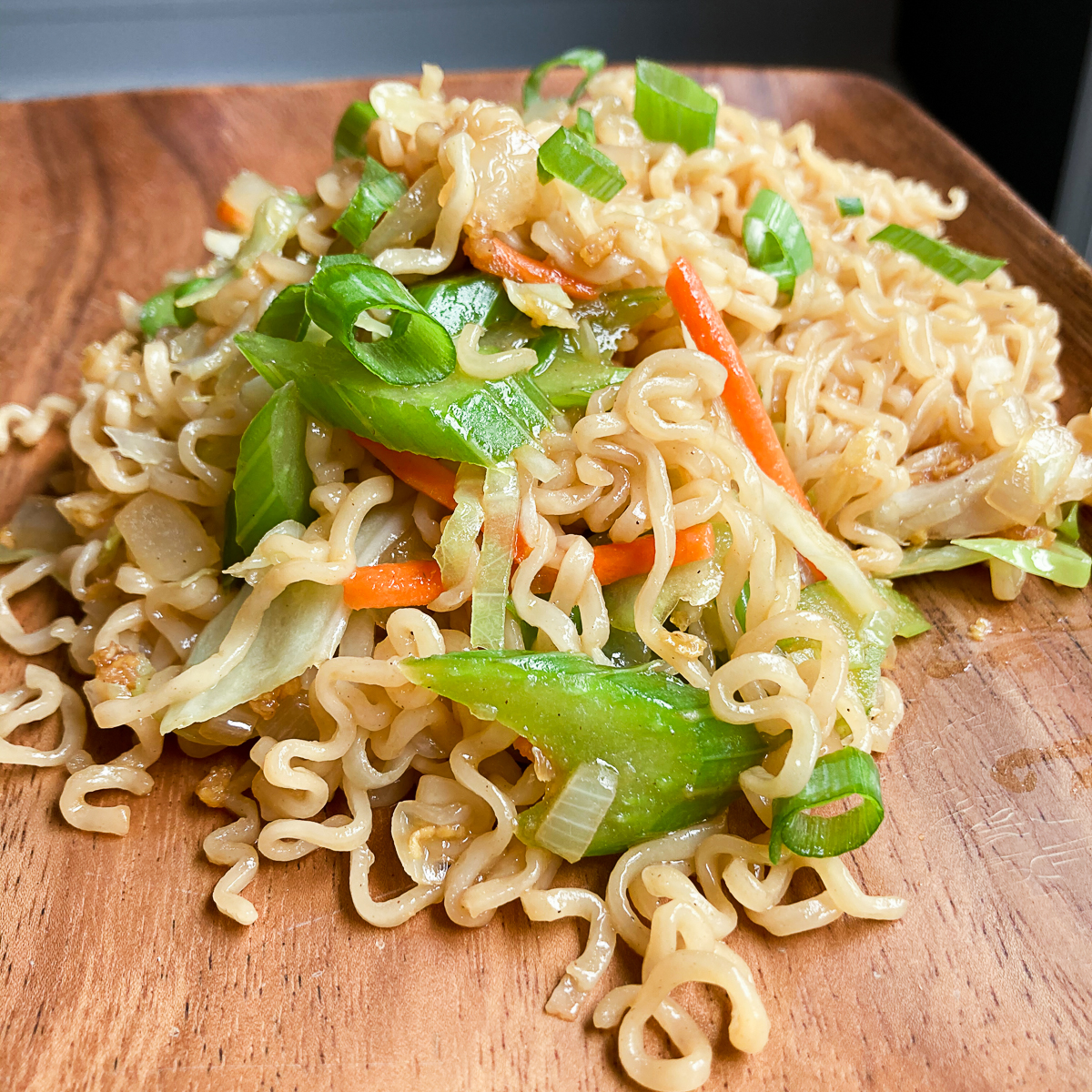 chow mein recipe on wooden plate