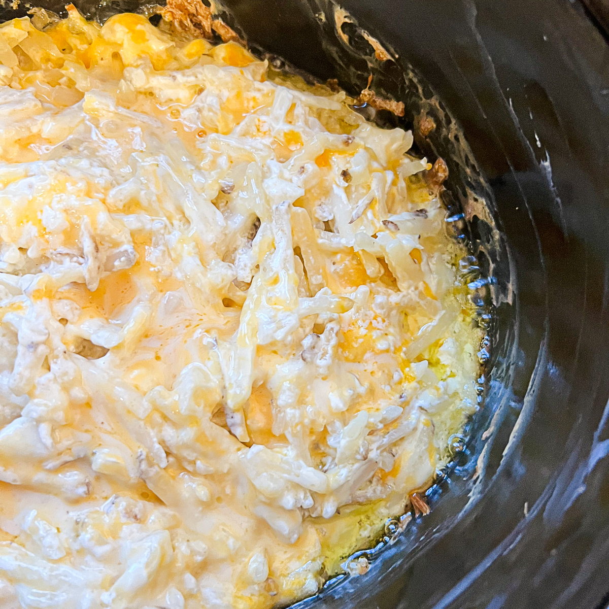 Cracker Barrel Cheesy potatoes recipe in crockpot after cooking