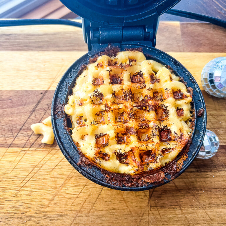 Mac and cheese waffle inside a dash mini waffle maker