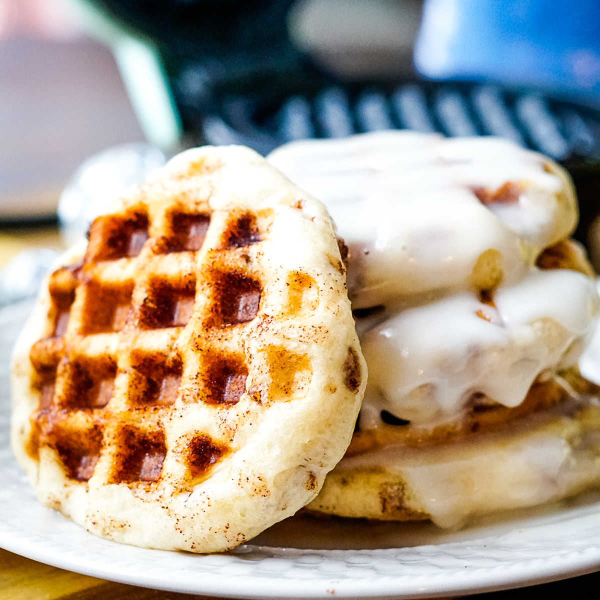 cinnamon roll waffles with frosting on top